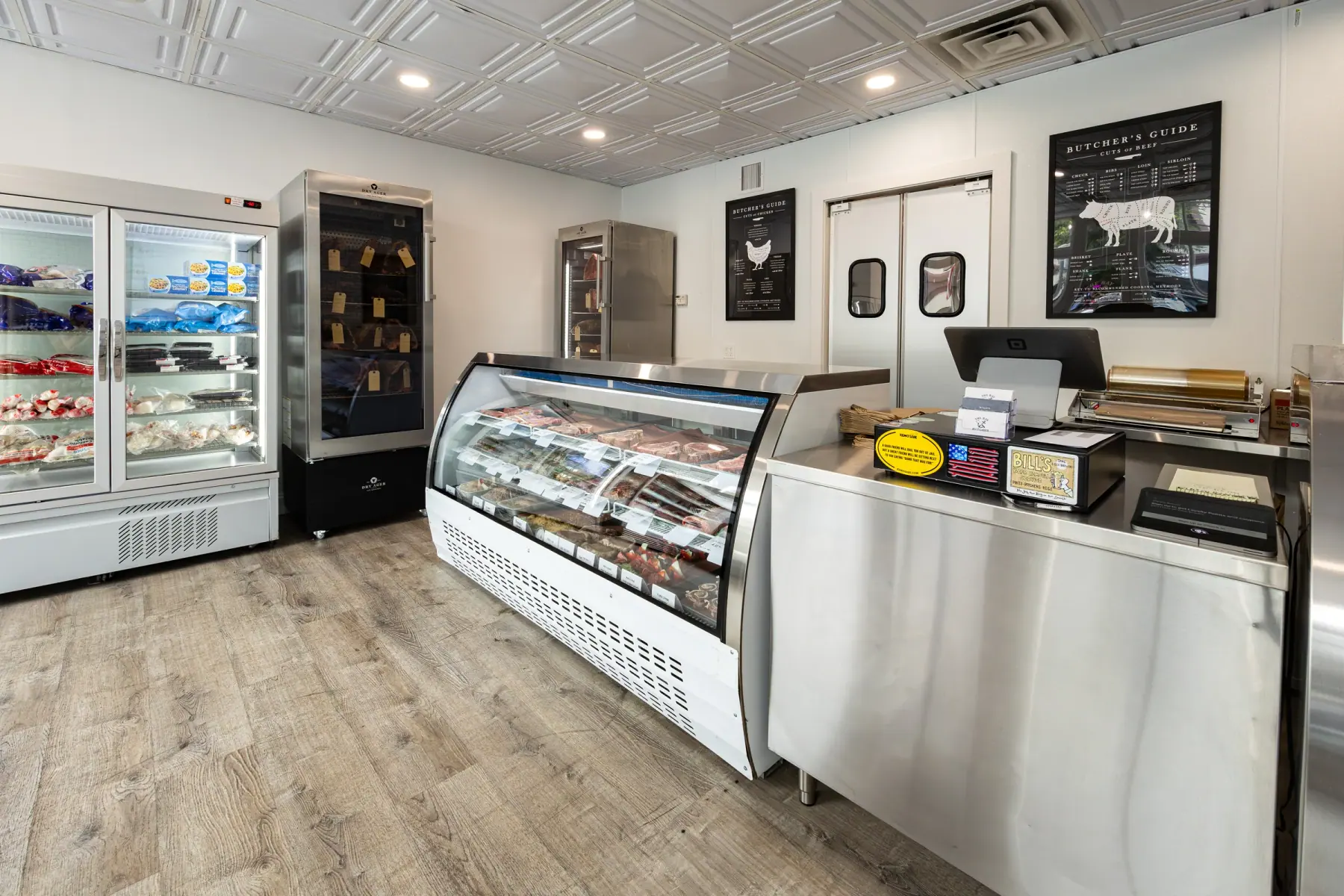 The butcher case running the length of the shop